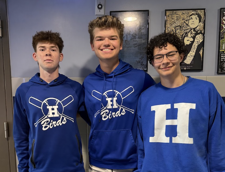 Jackson Hartle (12), Brennan Bucher (12), and Liam Delaney (12) all show their support for the Bluebirds by sporting spirit wear. 